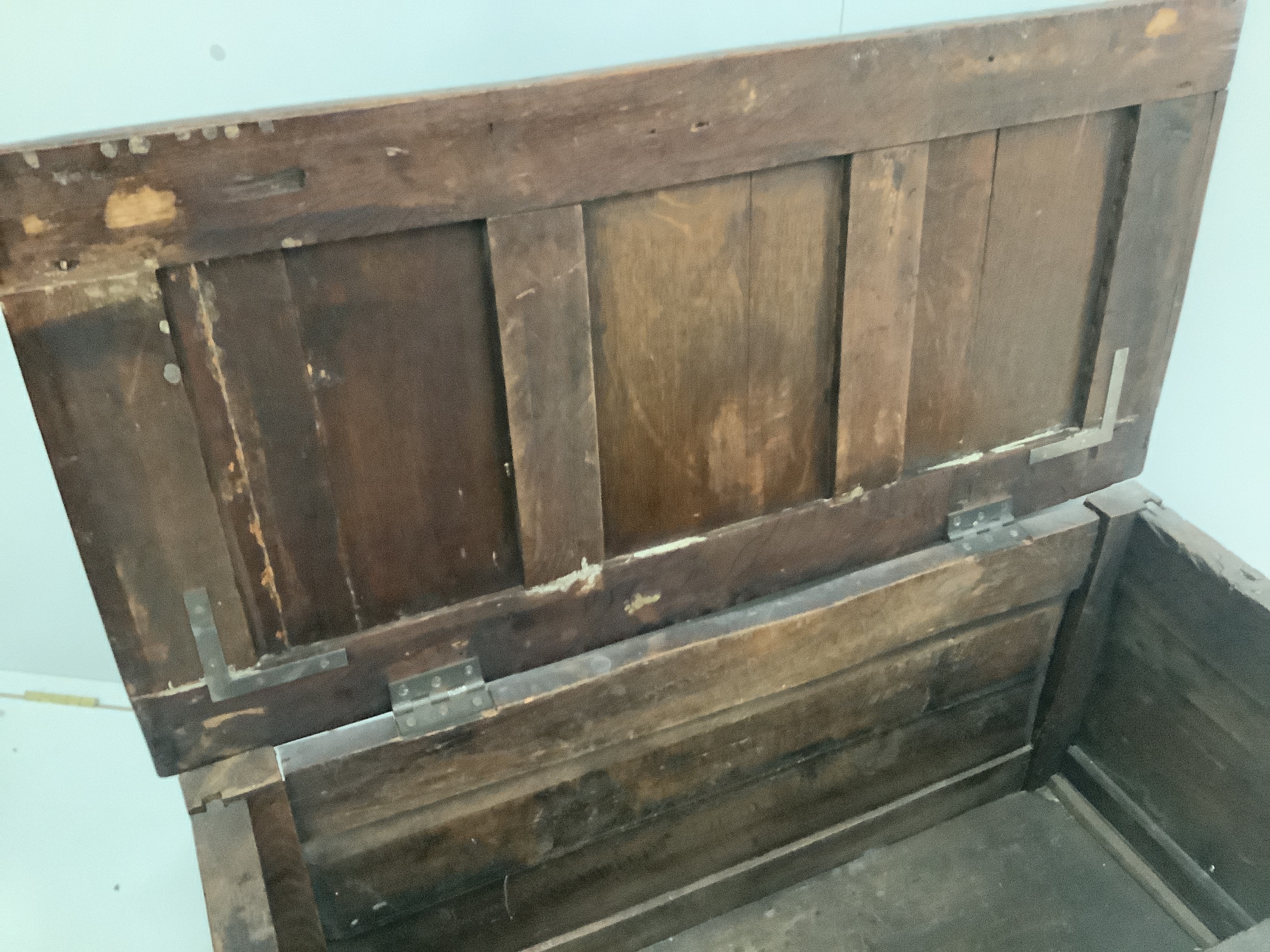 A small 17th century and later panelled oak coffer, width 99cm, depth 48cm, height 54cm